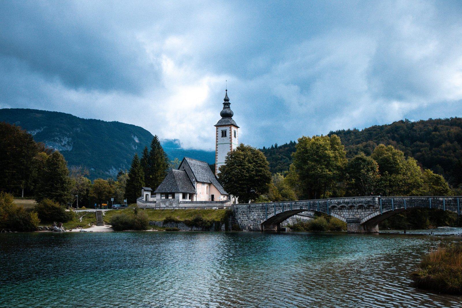 Lake Bohinj surrounded by the snow-capped peaks of the Julian Alps, Slovenia